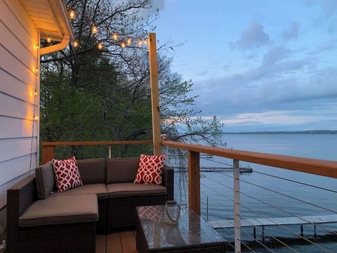 Upstairs Unit- Sunset views, cozy seating, and a front-row seat to Seneca Lake.