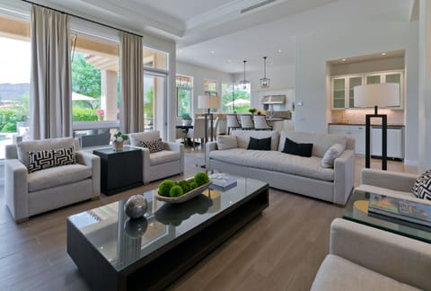 Family room with seating for 8. Wet bar with sink and mini fridge with ice maker