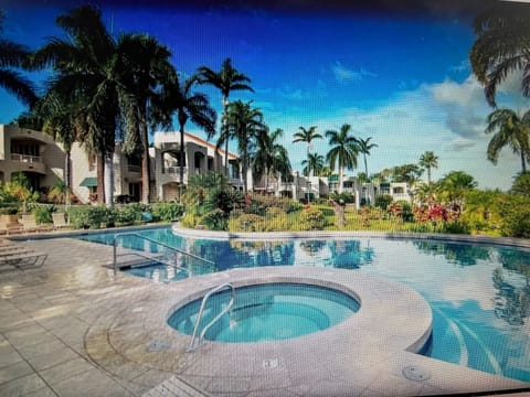 Pool & Spa with view of ocean. Just steps away  from our condo.