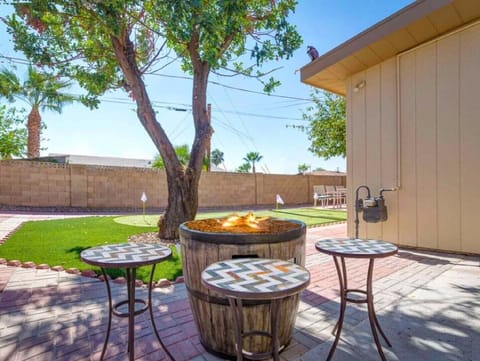 Sit by the firepit with a cocktail