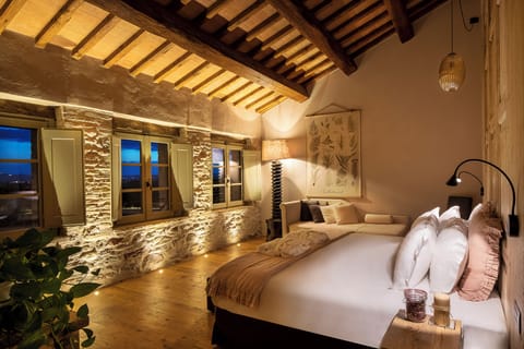 Junior Triple Room, Multiple Beds, Non Smoking, Garden View | Minibar, desk, laptop workspace, soundproofing