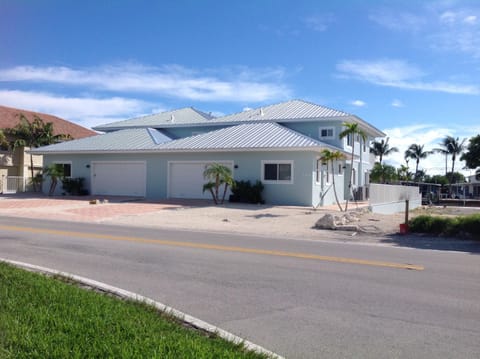 Front of duplex,  double car garage.