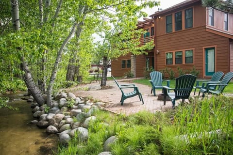 Relax on patio next to seasonal stream