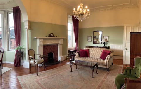 Gather in the grand living room before drifting to your own private turret.