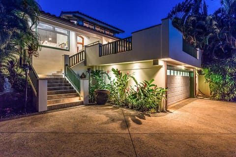 Front of home lights up beautifully at night 