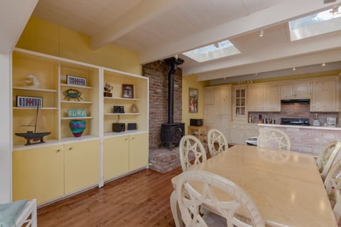 dining room with skylights