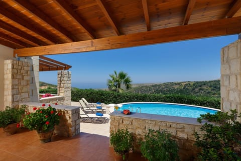 Villa Thimari - Balcony view- round swimming pool