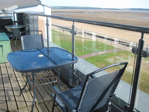 Sunny balcony overlooking beach