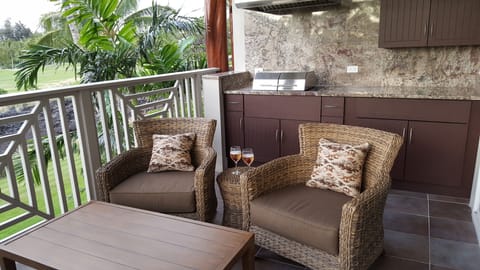 Convenient outdoor BBQ and cozy lanai furniture