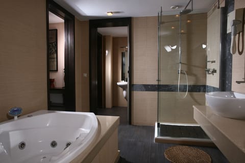 Shower, free toiletries, hair dryer, bathrobes