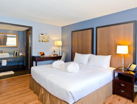 Deluxe Room, 1 King Bed | Premium bedding, pillowtop beds, individually decorated