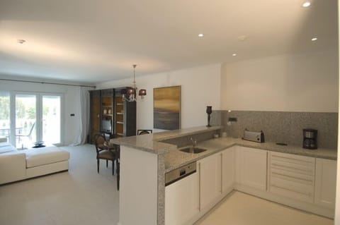 Standard Apartment, 2 Bedrooms | Living room | 36-inch flat-screen TV with digital channels, TV