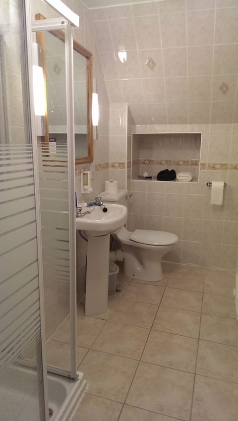 Shower, free toiletries, hair dryer, towels