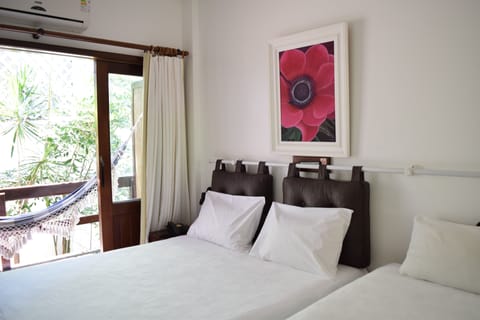 Triple Room | Minibar, in-room safe, laptop workspace, soundproofing