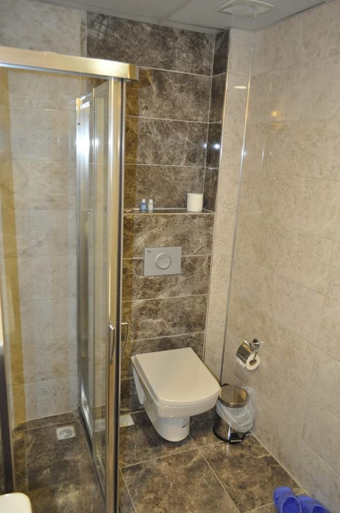 Shower, free toiletries, hair dryer, slippers