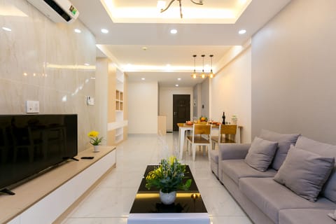 Luxury Apartment, Pool View | Living area | TV