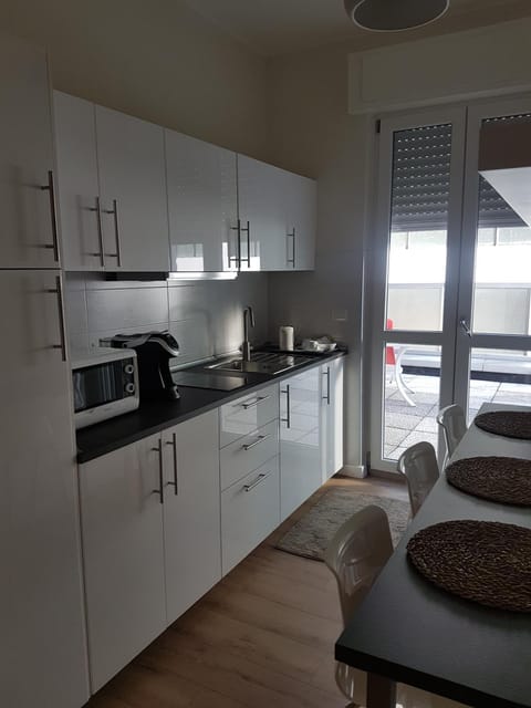 Fridge, microwave, stovetop, cookware/dishes/utensils