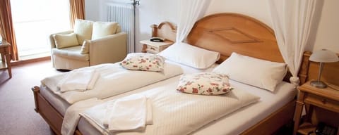 Hypo-allergenic bedding, desk, blackout drapes, iron/ironing board