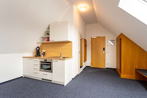 Junior Apartment | Hypo-allergenic bedding, desk, laptop workspace, blackout drapes