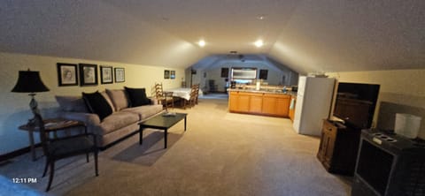 Open concept suite, living area, dining and we'll appointed kitchenette.