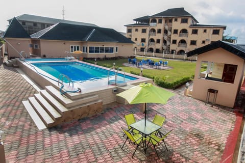 Outdoor pool, pool umbrellas, sun loungers