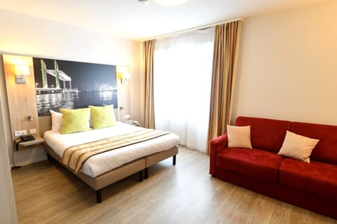 Bright and comfy bedroom — perfect to unwind after a day out.