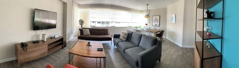Business Apartment, 4 Bedrooms | Living area | Flat-screen TV