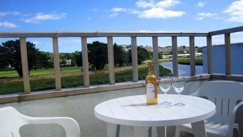 Relax on the balcony and enjoy the river view and spotting the swans!