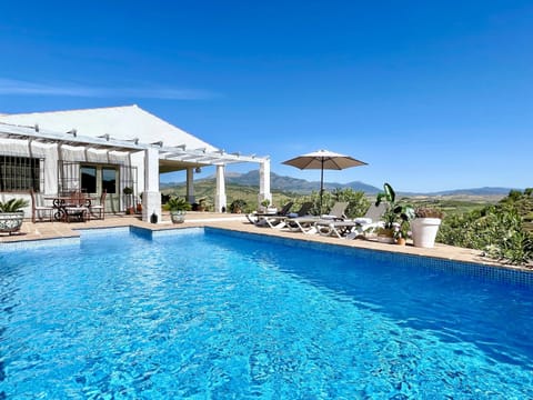 Swimming pool, BBQ terrace, 4 x sun loungers, alfresco dining table with views..