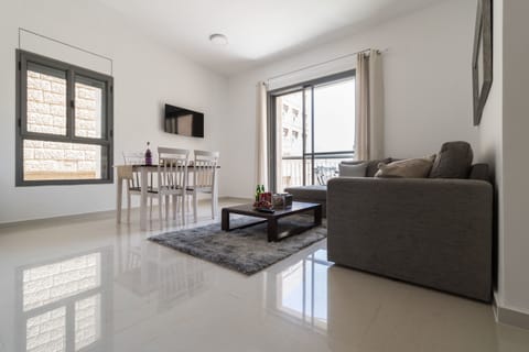 Comfort Apartment, 1 Bedroom | Living area | Flat-screen TV