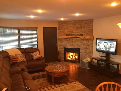 Family room with wood burning fireplace!