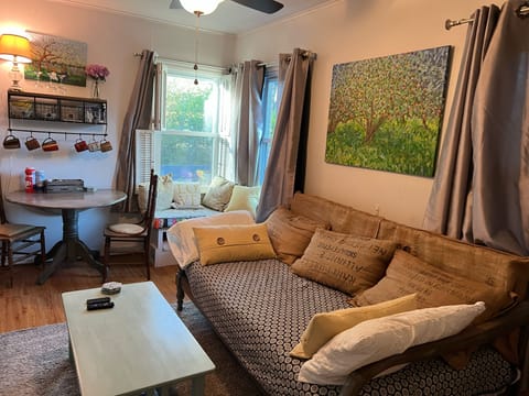 Media/coffee room has a twin size day bed serving as a comfy couch.