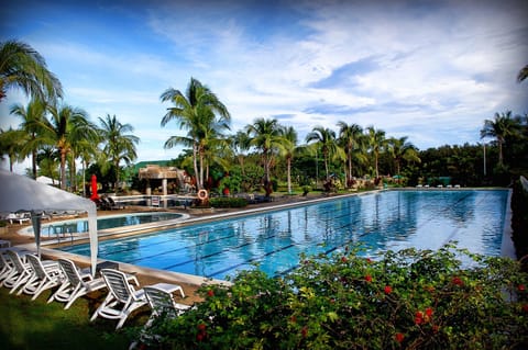 2 outdoor pools, open 7:00 AM to 9:00 PM, pool umbrellas, sun loungers