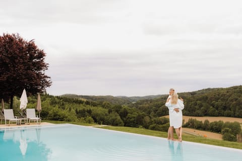 Seasonal outdoor pool, pool umbrellas, sun loungers