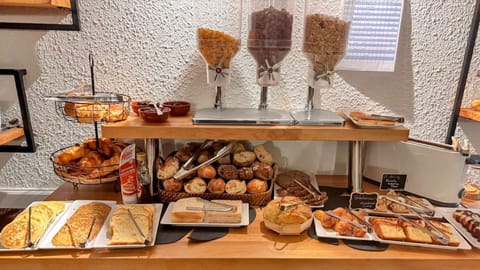 Daily buffet breakfast (EUR 12.50 per person)