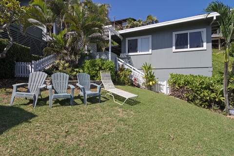 Fenced in yard for lounging or children's play area.