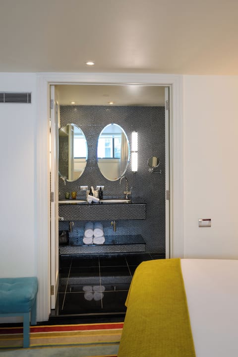 Loft Suite | Bathroom | Eco-friendly toiletries, hair dryer, bathrobes, slippers