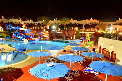 Outdoor pool, open 8:00 AM to 5:00 PM, pool umbrellas, sun loungers