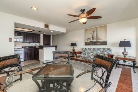 Signature Condo, 1 Bedroom, Balcony, Lake View | Living room | 48-inch Smart TV with cable channels, TV, Netflix