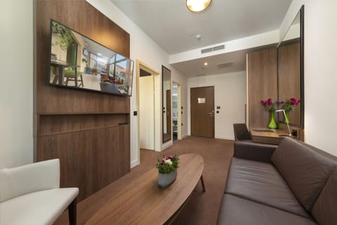 Junior Suite, 1 Bedroom, City View | 1 bedroom, minibar, in-room safe, individually decorated