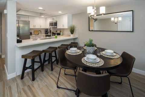 Beautiful kitchen and dining room with breakfast bar.