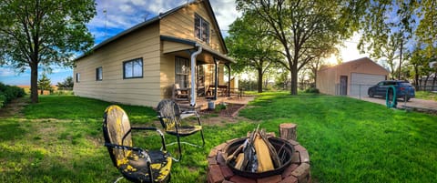 Lodge and garage
Fenced In Yard
Fire pit