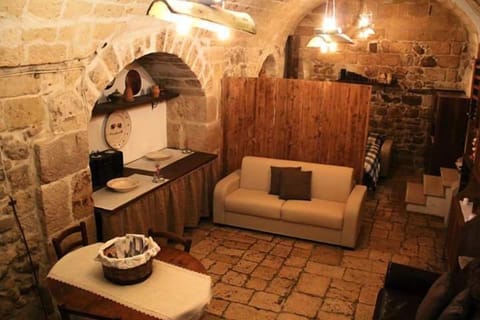 Quadruple Room | Living area | Flat-screen TV