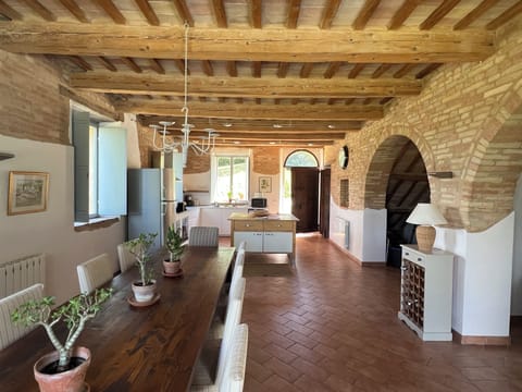 Large dining, kitchen and social space