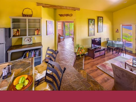 Sunken living room and entry way to master suite from kitchen