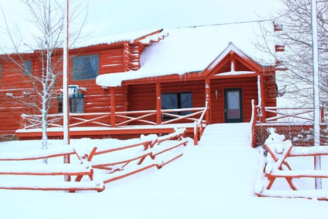 Front porch covered in snow