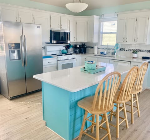 New Flooring Installed throughout entire cottage, Spring 2020, shown in photo