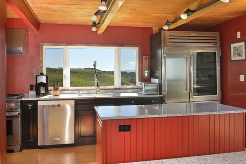 The kitchen is fully stocked with professional grade appliances.