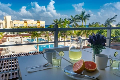 Large, private balcony with views of Caribbean Sea and pools!