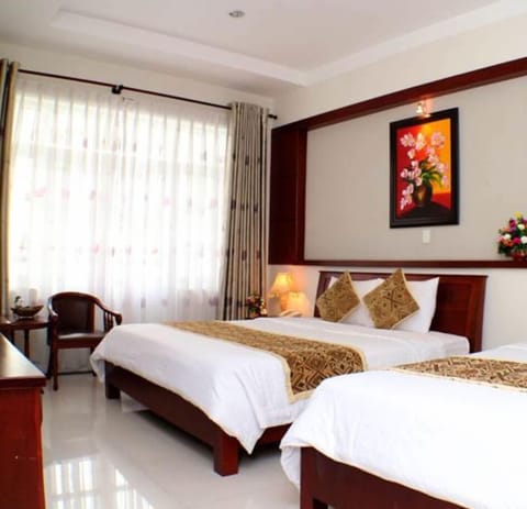 Family Triple Room | Desk, iron/ironing board, free WiFi, bed sheets